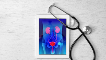 Tablet,Displaying,Urinary,System,And,Stethoscope,On,Wooden,Background.,Urology